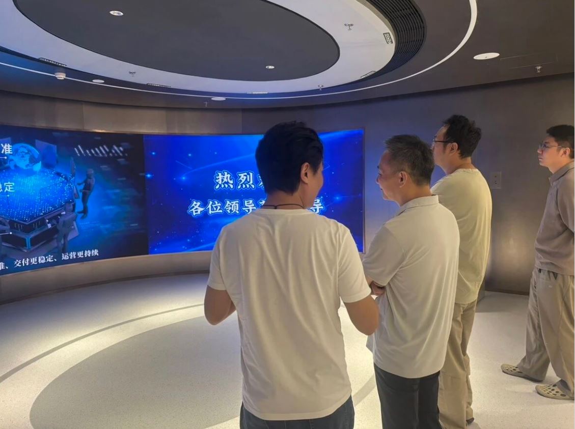 新华网图片中心主管到访国信中健参观交流